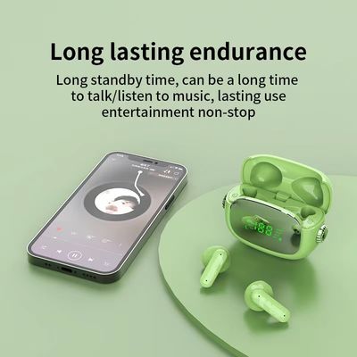 OEM ODMはMacaron ENC LEDデジタル表示装置 ミラーが付いているブルートゥースのイヤホーンを遊ばす